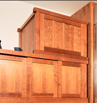 This stunning piece evokes an antique Japanese tansu. The asymmetry and varied door and drawer fronts reflect authentic tansu design features, and the hand-wrought iron hardware was sourced in Japan.