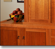The tansu provides ample storage and work space, all in a beautiful alternative to an ordinary wall of upper and lower cabinets with an appliance-cluttered countertop.