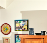 The tansu provides ample storage and work space, all in a beautiful alternative to an ordinary wall of upper and lower cabinets with an appliance-cluttered countertop.
