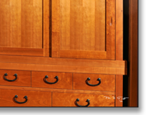 The tansu provides ample storage and work space, all in a beautiful alternative to an ordinary wall of upper and lower cabinets with an appliance-cluttered countertop.