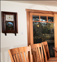 Cherry millwork integrates the dining furniture and surrounding architecture. Dining room photos by Peter R. Taft Photography.