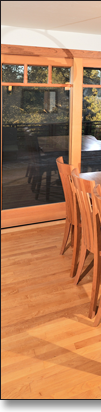 J.T. designed this cherry dining table, which normally seats six but can accommodate up to ten. Table and chairs available separately, and in other woods.