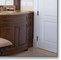 Curved-front walnut “vanity for her,” created to designer's specifications.