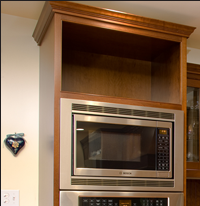 Note the inset doors and drawers, with solid face frames and beaded openings.