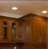 Note the inset doors and drawers, with solid face frames and beaded openings.