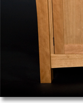 Cherry sideboard designed by J.T. John; note grain match on the drawer fronts, built from a single piece of wood.