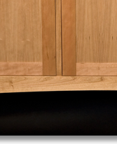 Cherry sideboard designed by J.T. John; note grain match on the drawer fronts, built from a single piece of wood.