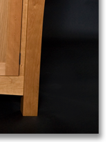 Cherry sideboard designed by J.T. John; note grain match on the drawer fronts, built from a single piece of wood.