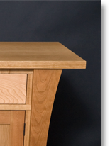 Cherry sideboard designed by J.T. John; note grain match on the drawer fronts, built from a single piece of wood.