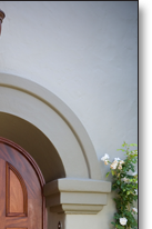 Arched mahogany front door, designed by J.T. John for a Los Angeles, California home, after considerable research into the original design features of the 1920's house and neighborhood.