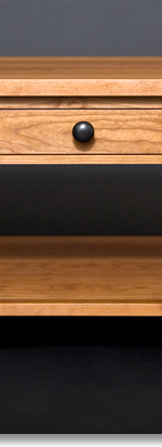 Another cherry coffee table designed by J.T. John.