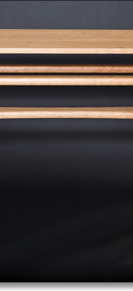 Matching cherry sofa table designed by J.T. John.