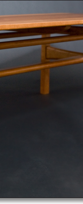 Cherry coffee table designed by J.T. John.