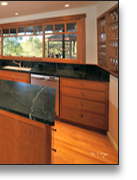Cherry kitchen designed by J.T. John to meld the clients' love of Shaker, Japanese, and nautical styling.